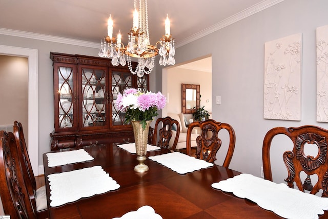 dining room featuring a chandelier and ornamental molding