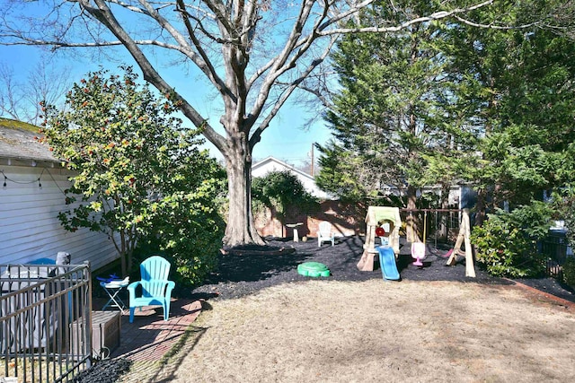 view of yard featuring a playground