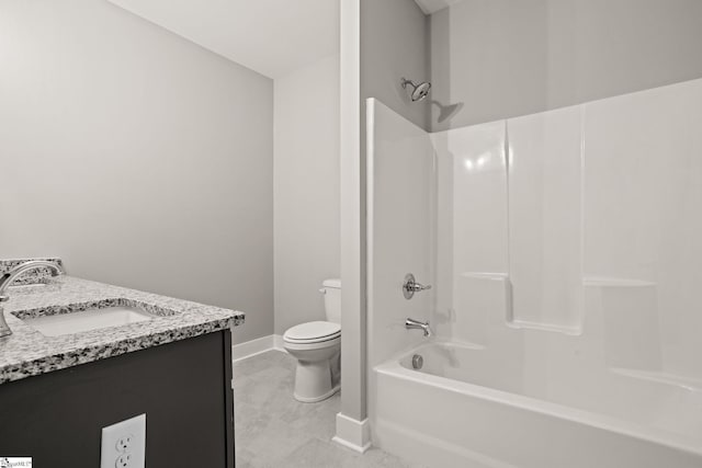 full bathroom with tile patterned floors,  shower combination, vanity, and toilet