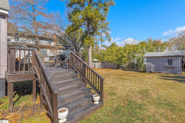 view of yard with a deck and a shed