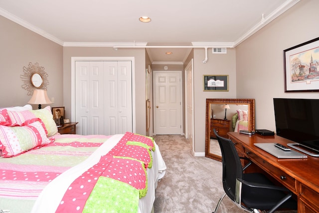 bedroom with ornamental molding, light colored carpet, and a closet