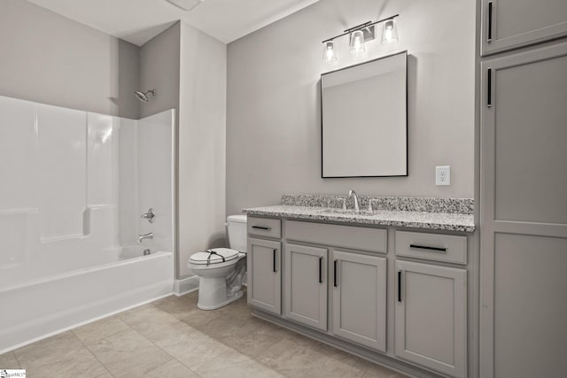 full bathroom featuring toilet, shower / bathing tub combination, tile patterned floors, and vanity