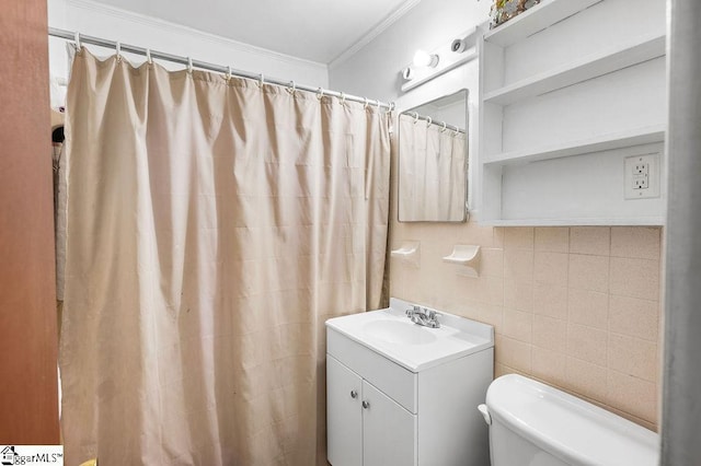 bathroom featuring tile walls, ornamental molding, tasteful backsplash, toilet, and vanity