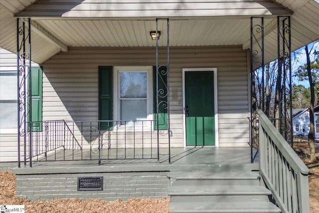 property entrance with a porch