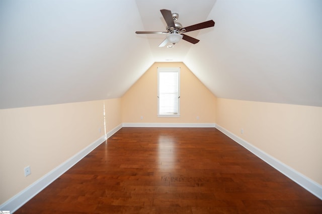 bonus room featuring lofted ceiling, ceiling fan, and dark hardwood / wood-style flooring