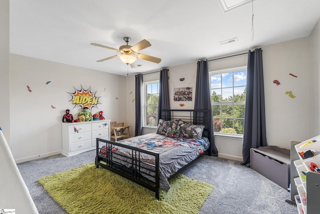 carpeted bedroom featuring ceiling fan