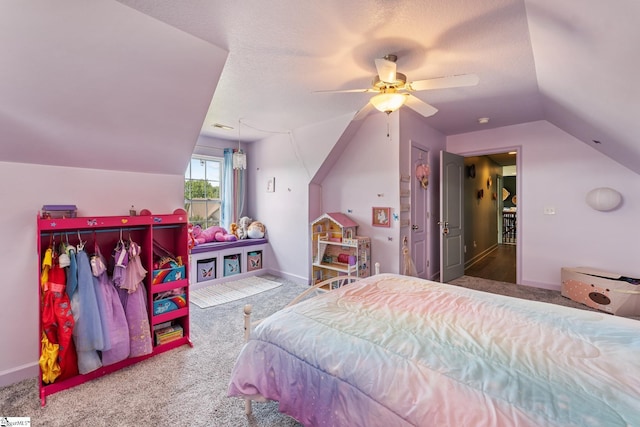 bedroom featuring carpet flooring, ceiling fan, and vaulted ceiling