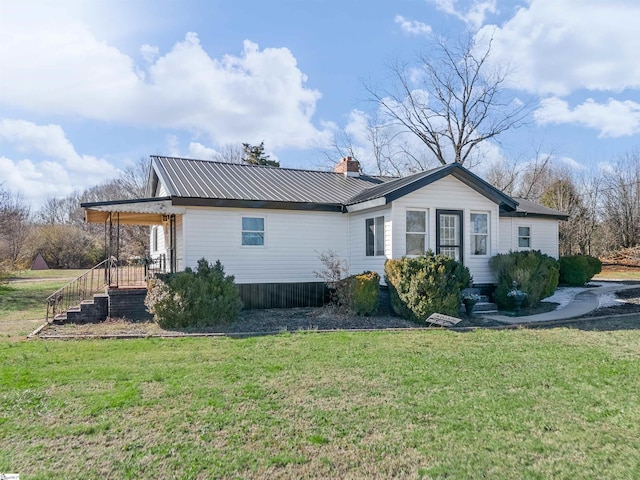 exterior space featuring a lawn