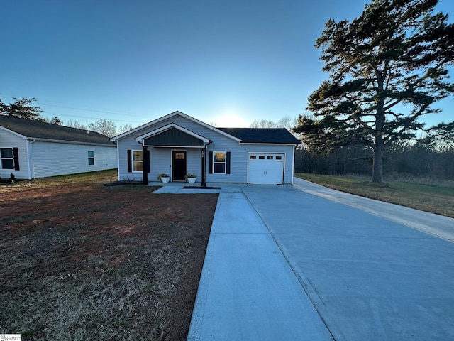 view of front of house with a porch and a garage