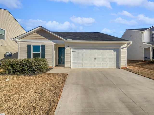 ranch-style home with a garage