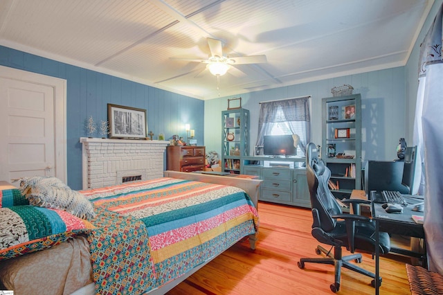 bedroom with hardwood / wood-style flooring and ceiling fan