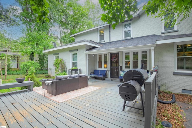 wooden deck with outdoor lounge area