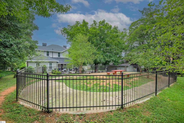 view of community featuring a yard