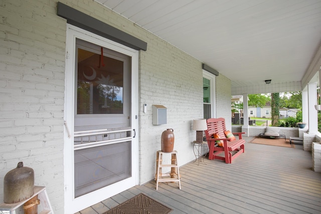 wooden deck with a porch