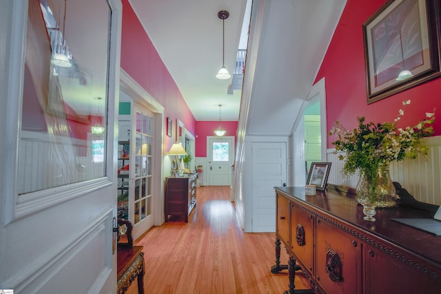 corridor featuring light hardwood / wood-style flooring