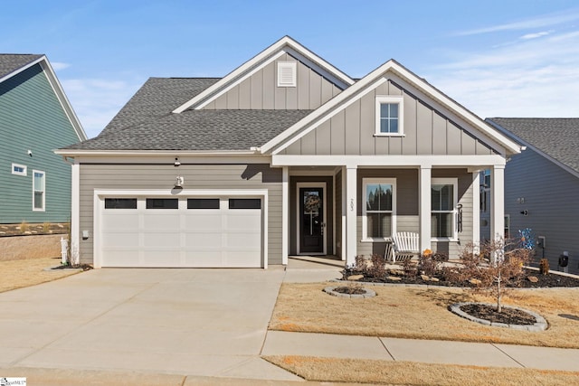 craftsman-style house with a garage and covered porch