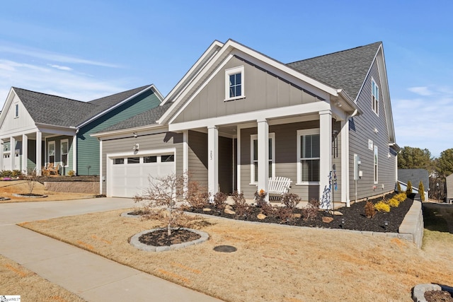 craftsman-style home featuring a porch and a garage