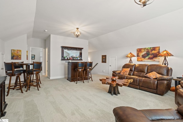 carpeted living room with lofted ceiling and bar area