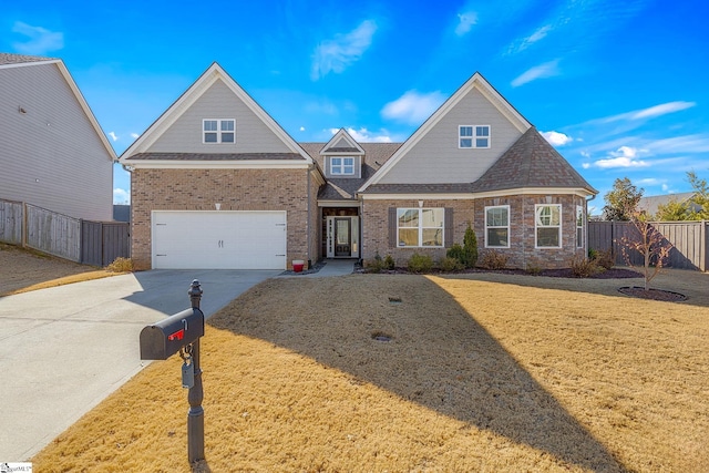 view of front facade featuring a front yard and a garage