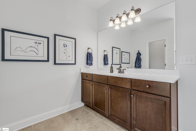 bathroom featuring vanity and tile patterned flooring