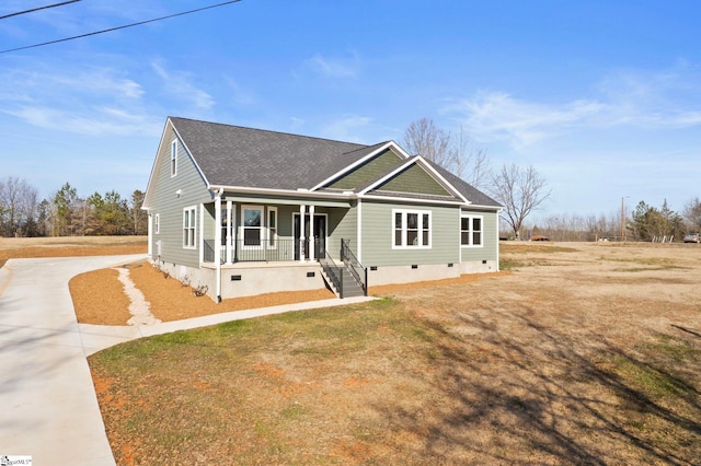 view of front of house featuring a porch and a front lawn