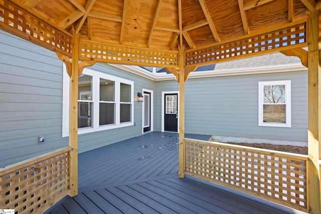 wooden deck featuring a gazebo