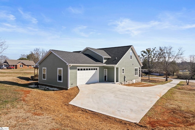 view of side of home with a garage