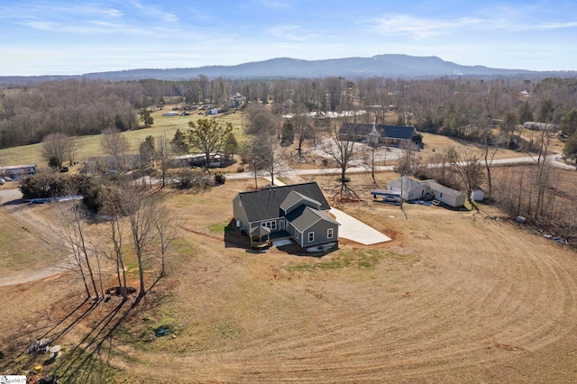 bird's eye view with a rural view and a mountain view