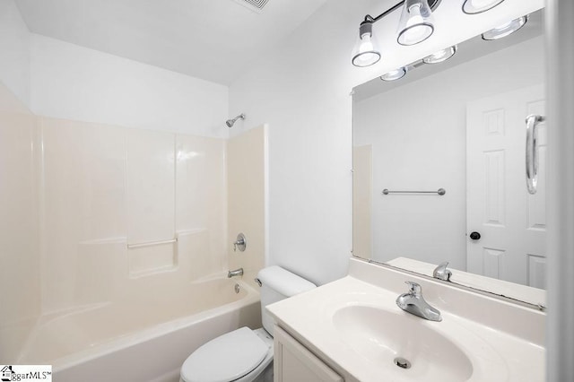 full bathroom with toilet, vanity, and bathing tub / shower combination