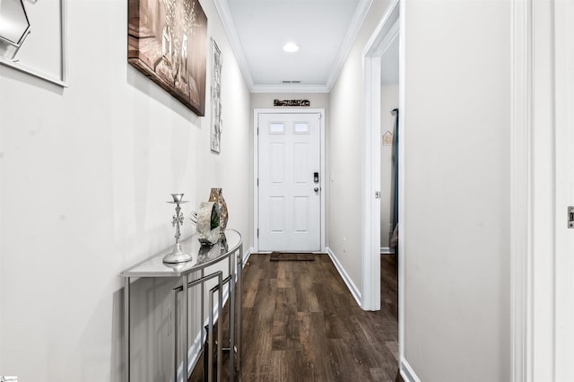 doorway with dark wood-type flooring and ornamental molding