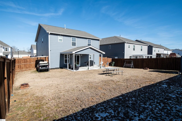 rear view of property with a patio