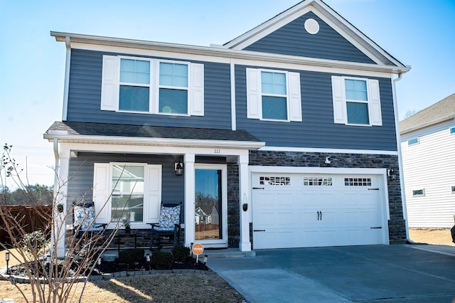 view of front of home with a garage