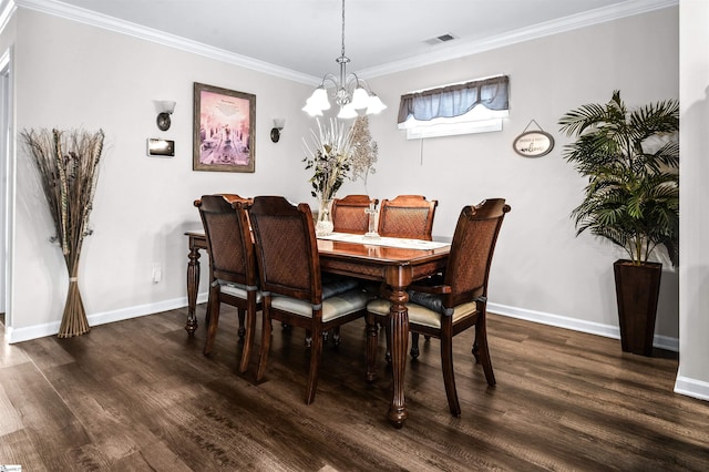 dining area with ornamental molding, dark wood-type flooring, and a chandelier