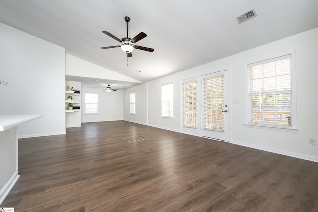 unfurnished living room with lofted ceiling, ceiling fan, and dark hardwood / wood-style floors