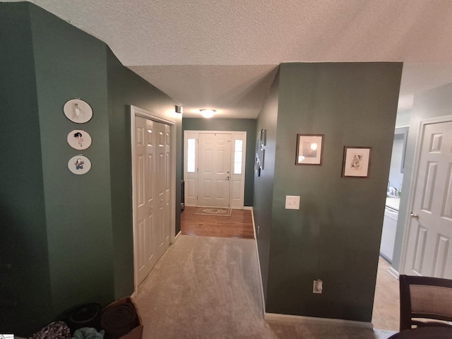 interior space featuring a textured ceiling