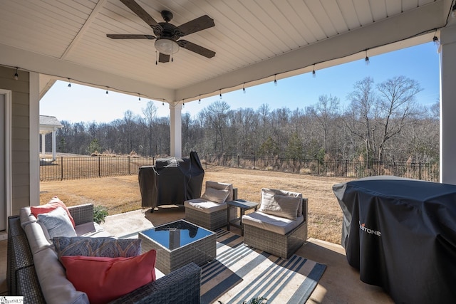 view of patio with ceiling fan, area for grilling, and outdoor lounge area