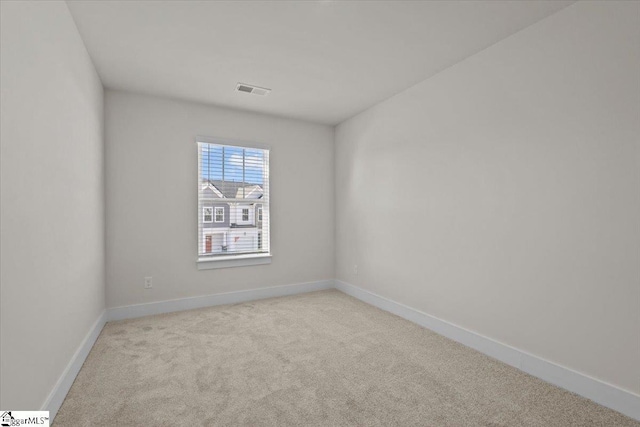 view of carpeted spare room