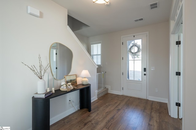 foyer featuring dark hardwood / wood-style floors