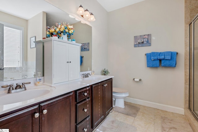 bathroom with toilet, tile patterned flooring, an enclosed shower, and vanity