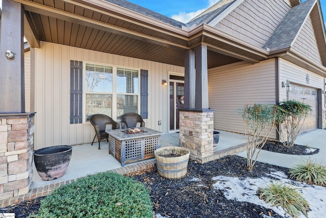 view of exterior entry featuring a porch