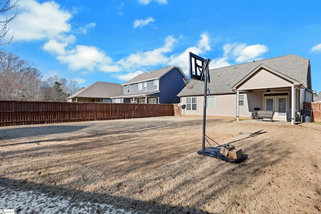 exterior space with ceiling fan and a patio