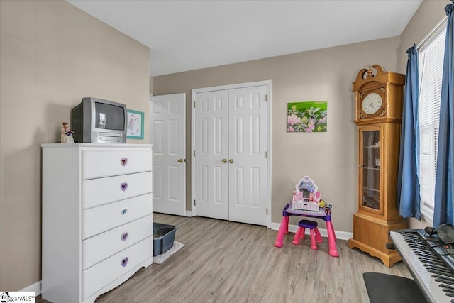 rec room featuring light hardwood / wood-style floors