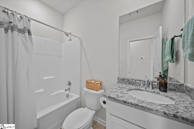 full bathroom with toilet, shower / bath combination with curtain, and vanity