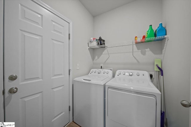 washroom featuring separate washer and dryer