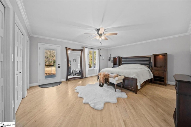 bedroom featuring ceiling fan, access to exterior, light hardwood / wood-style floors, and ornamental molding