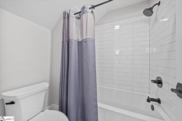 bathroom featuring toilet, lofted ceiling, and shower / tub combo with curtain