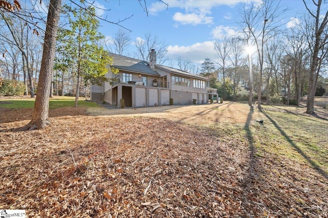 exterior space with a deck and a yard