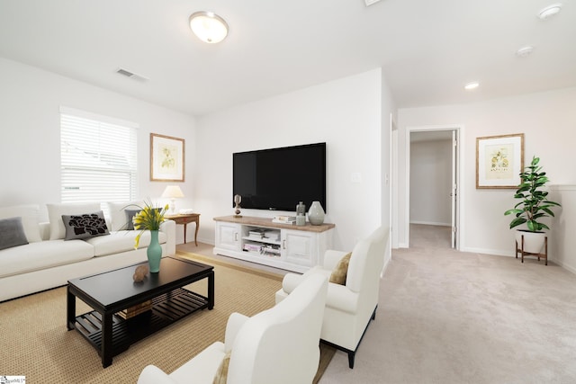 living room featuring light colored carpet