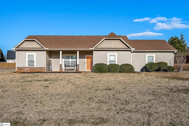 view of front of property with a front lawn and a porch