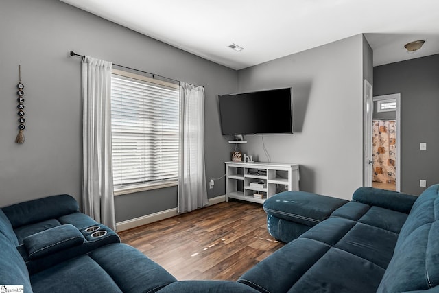 living room featuring dark hardwood / wood-style floors